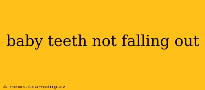baby teeth not falling out