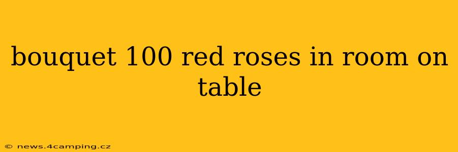 bouquet 100 red roses in room on table