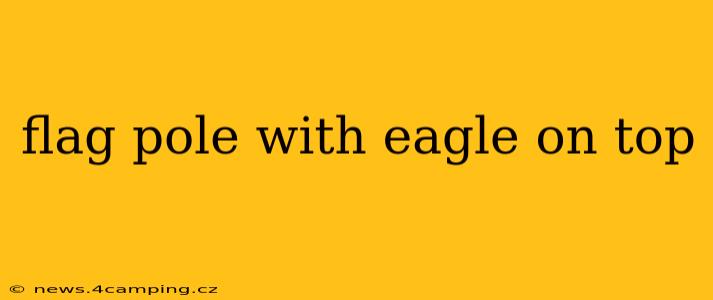 flag pole with eagle on top