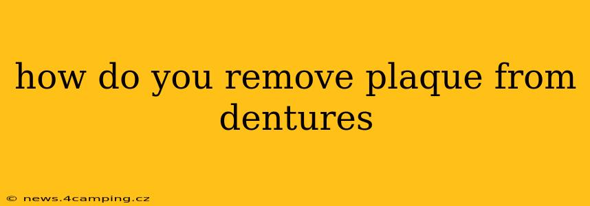 how do you remove plaque from dentures