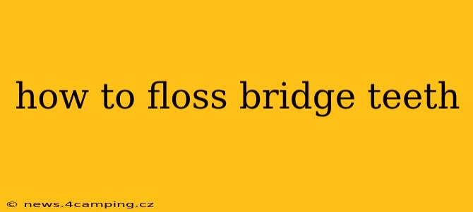 how to floss bridge teeth