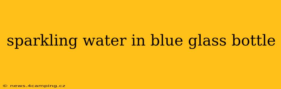 sparkling water in blue glass bottle