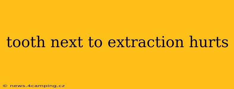tooth next to extraction hurts